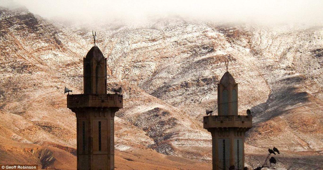 Photographer Karim Bouchetata said villagers were stunned by the snowy scene in the Sahara desert 